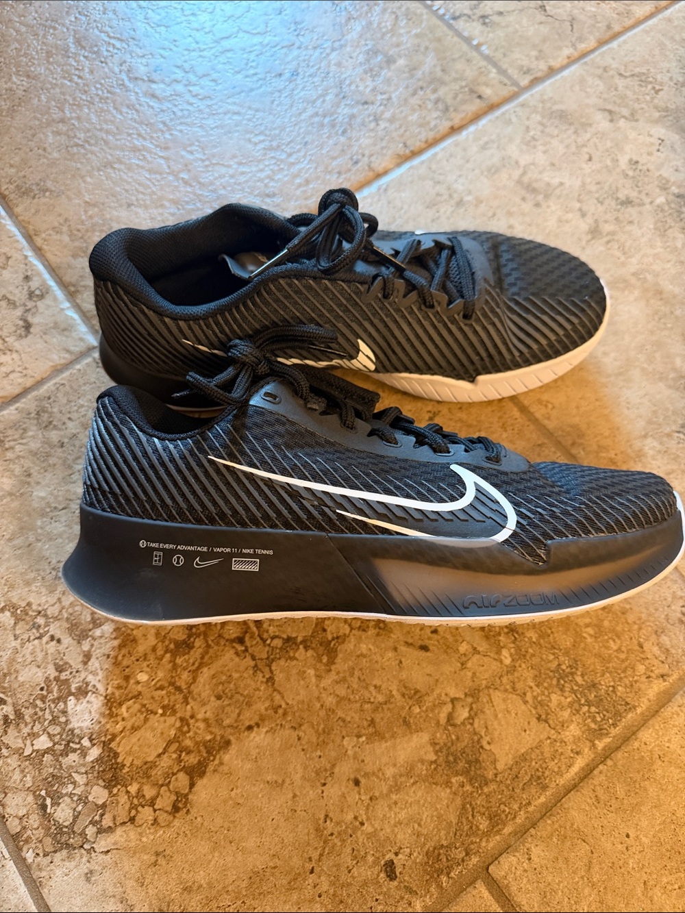 Nike Black Athletic Shoes with White Swoosh